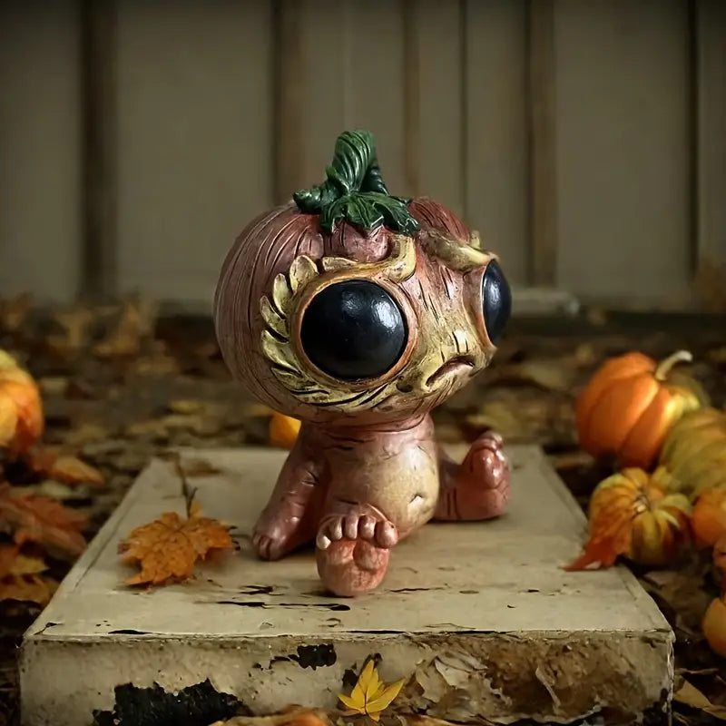 Whimsical Pumpkin-Shaped Alien Elf Figurine